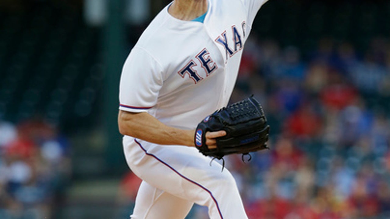 Hamels goes 8 innings for Texas in 9-0 win over Indians